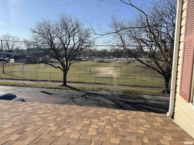 view of patio / terrace featuring fence