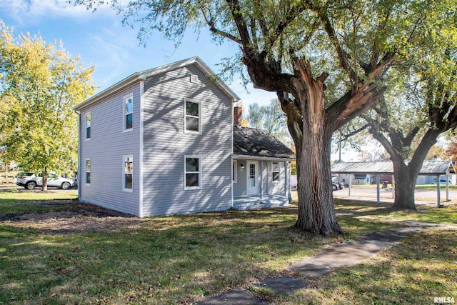 view of property exterior featuring a yard