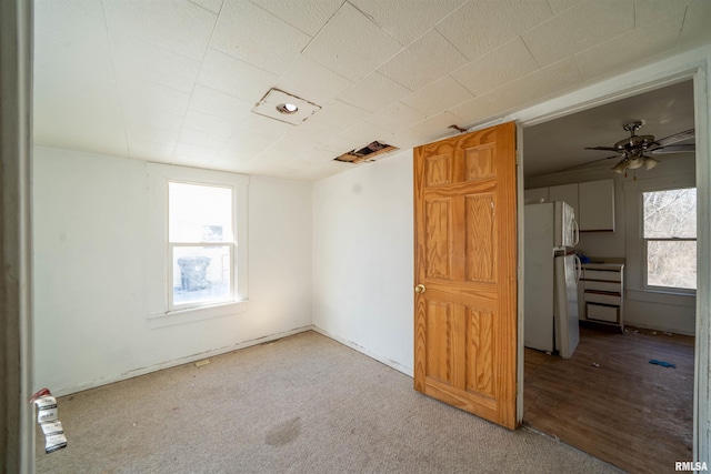 empty room with a ceiling fan