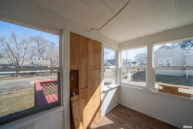 sunroom / solarium with wood ceiling