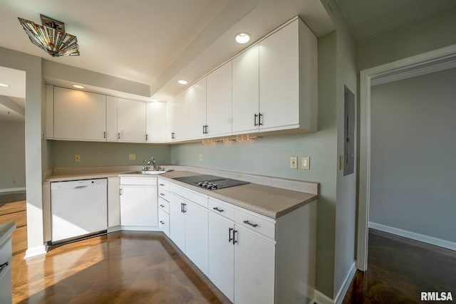 kitchen featuring a sink, recessed lighting, white dishwasher, black electric cooktop, and baseboards