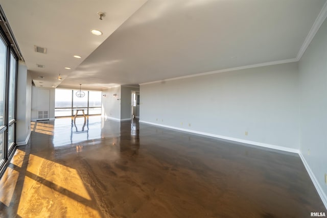 unfurnished room featuring a wall of windows, finished concrete flooring, baseboards, visible vents, and ornamental molding