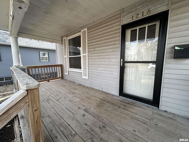 wooden deck with a porch