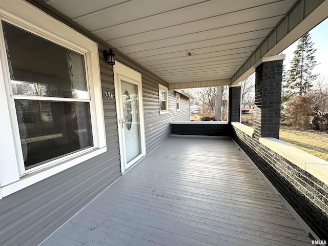 deck featuring covered porch