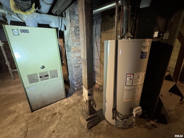 utility room featuring gas water heater and heating unit