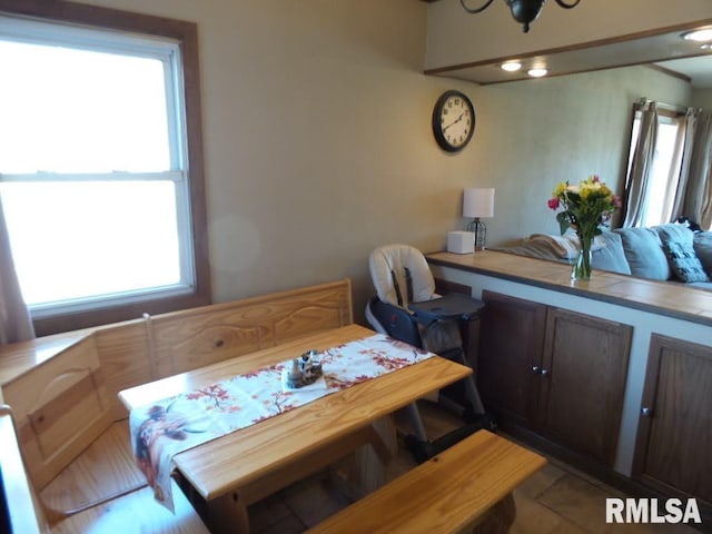 dining room featuring light tile patterned flooring