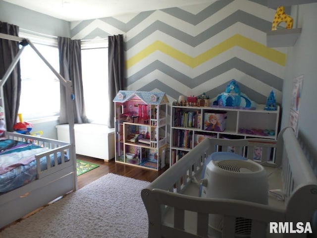 bedroom featuring wood finished floors