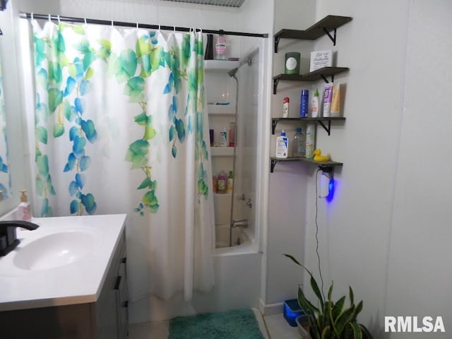 full bath featuring shower / tub combo with curtain and vanity