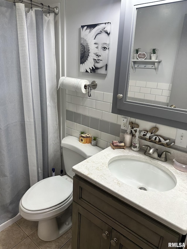 full bath with vanity, a shower with curtain, tile patterned flooring, tile walls, and toilet