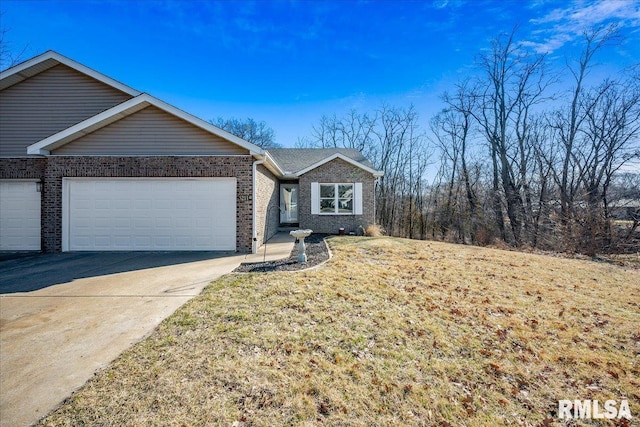 ranch-style home featuring a garage, brick siding, and concrete driveway