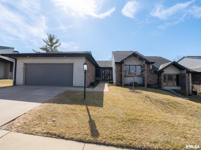 view of front of house featuring brick siding, concrete driveway, a front lawn, and a garage