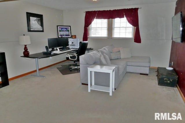 home office featuring carpet flooring and baseboards