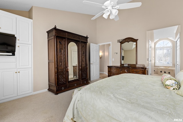 bedroom featuring baseboards, light carpet, and a ceiling fan