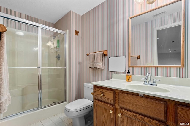 full bathroom featuring toilet, a stall shower, tile patterned flooring, and wallpapered walls