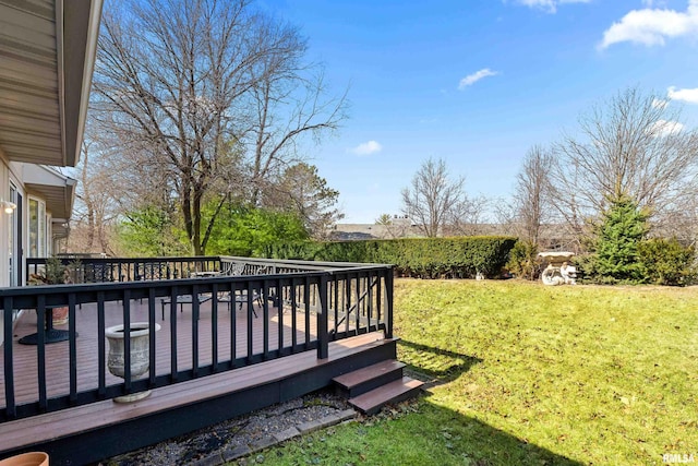 view of yard with a wooden deck