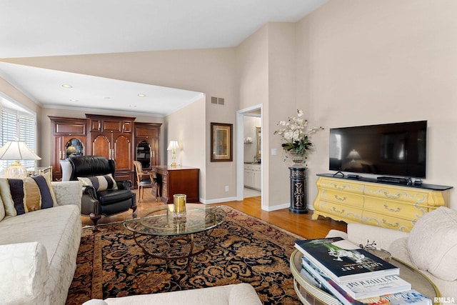 living room with baseboards, visible vents, high vaulted ceiling, light wood-style flooring, and recessed lighting