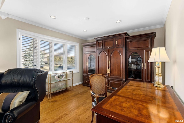 office space with light wood finished floors, recessed lighting, crown molding, and baseboards