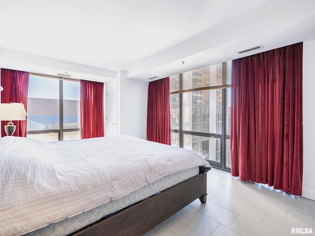 bedroom with visible vents