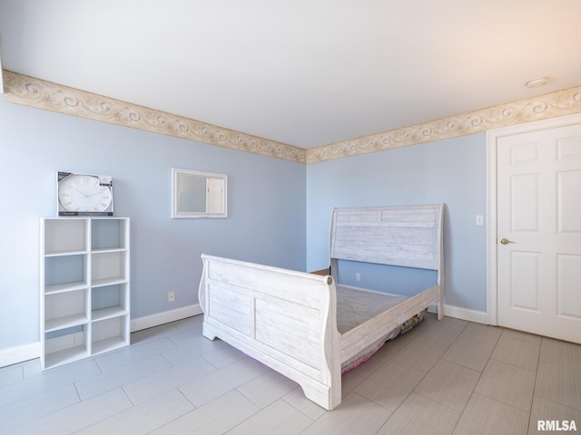 unfurnished bedroom with baseboards