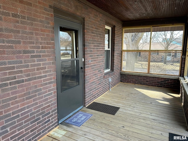 exterior space with brick siding