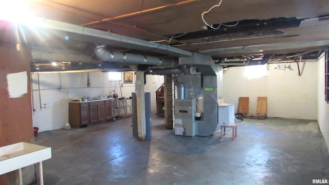 basement featuring heating unit