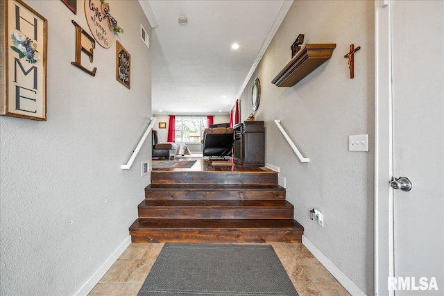 stairs with visible vents, recessed lighting, baseboards, and ornamental molding