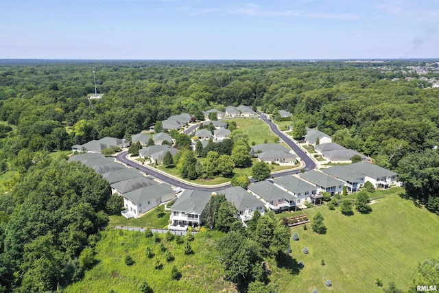 5622 W Woodbriar Ln, Peoria, IL 61615 - aerial view of property and surrounding area with a heavily wooded area and nearby suburban area