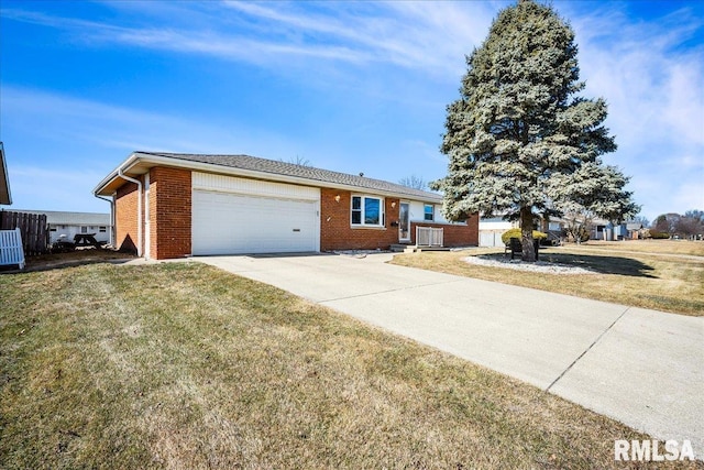 ranch-style home featuring a front yard, concrete driveway, brick siding, and a garage