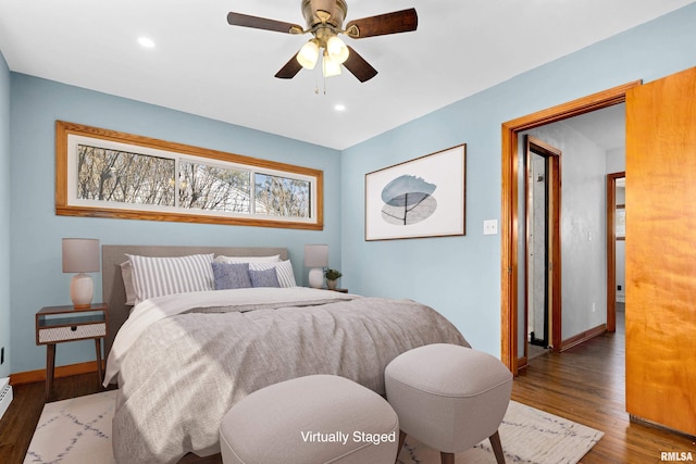 bedroom with recessed lighting, wood finished floors, baseboards, and ceiling fan