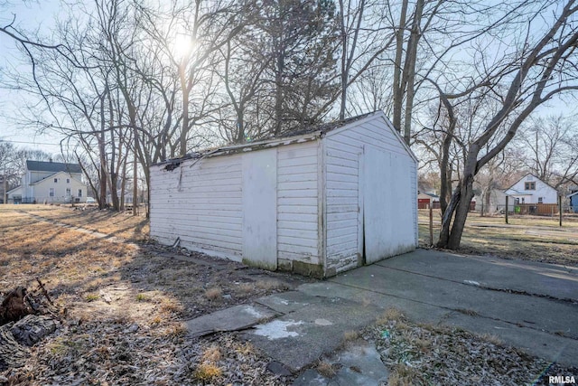 view of shed with fence