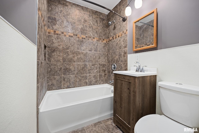 full bath with vanity, toilet, and washtub / shower combination