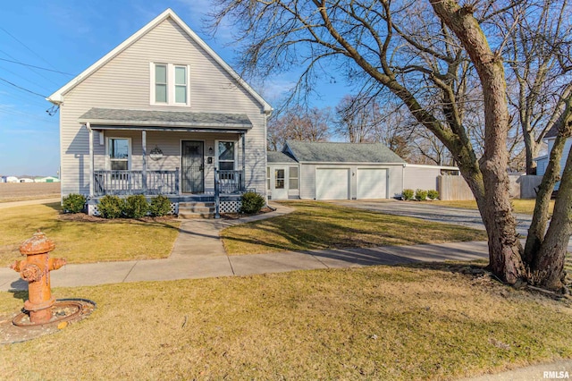 bungalow-style home featuring a garage, a porch, driveway, and a front lawn