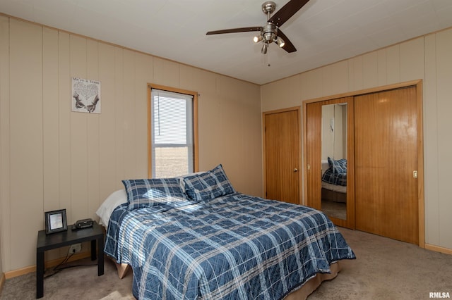 carpeted bedroom with a ceiling fan