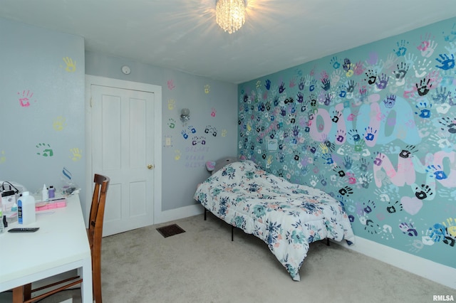 bedroom featuring carpet flooring, visible vents, and baseboards