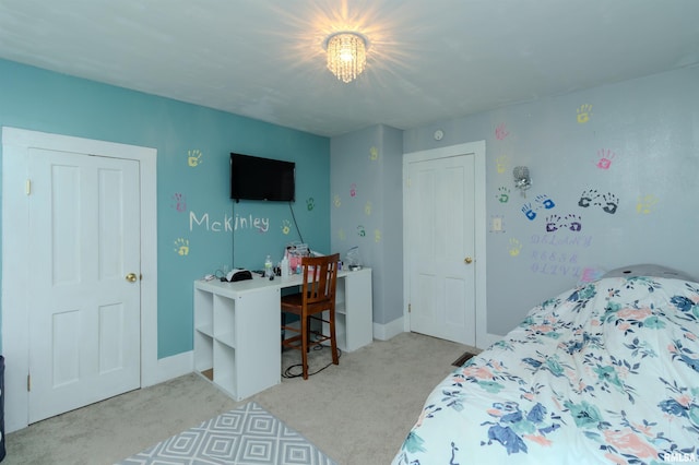 bedroom with carpet flooring and baseboards