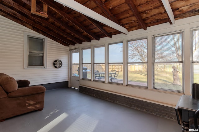 sunroom featuring a wealth of natural light, wooden ceiling, and lofted ceiling with beams