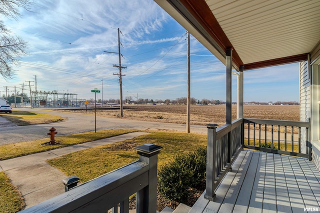 wooden terrace with covered porch