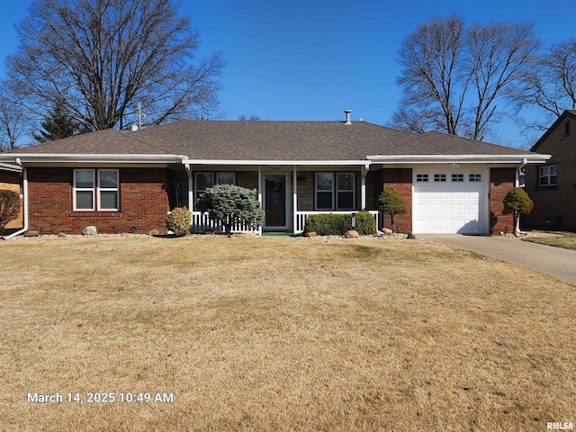 ranch-style house with a garage, driveway, brick siding, and a front lawn