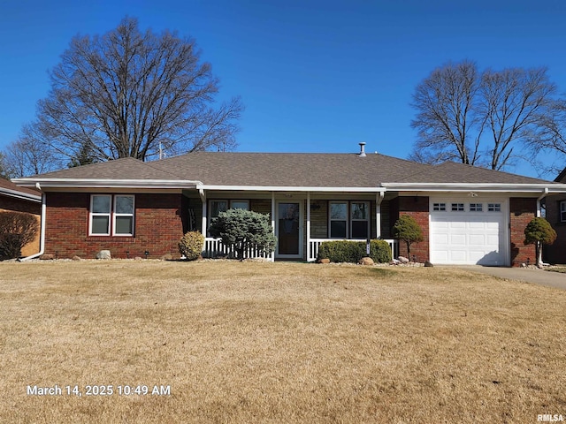 ranch-style home featuring brick siding, a front lawn, concrete driveway, covered porch, and an attached garage