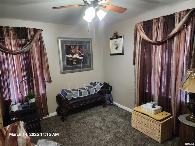 bedroom featuring baseboards, carpet floors, and a ceiling fan