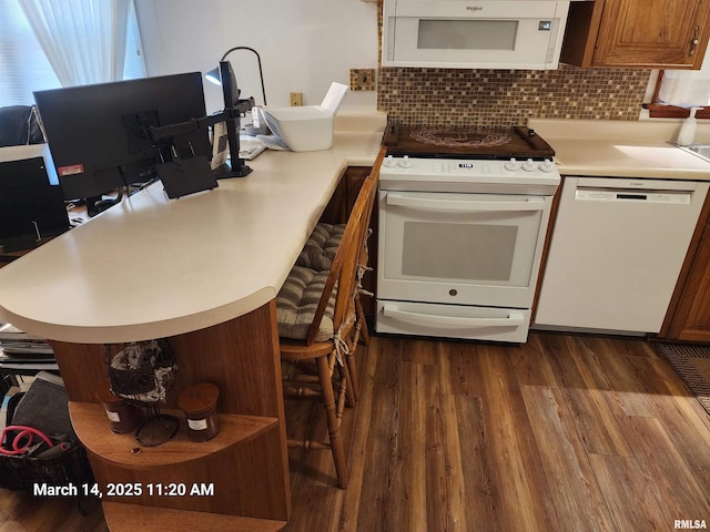 kitchen with open shelves, white appliances, a peninsula, and dark wood-style flooring