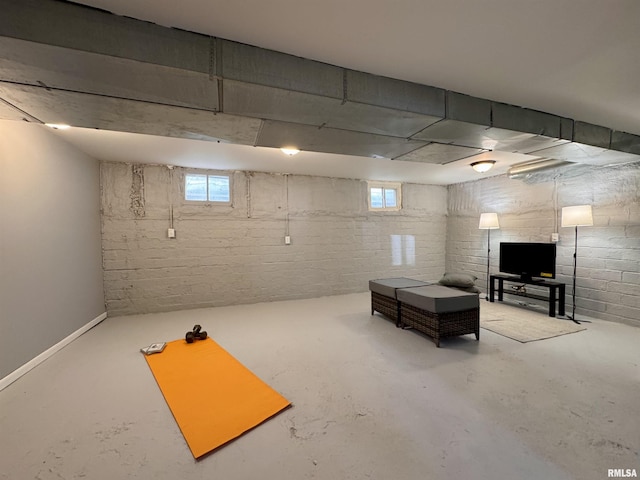 basement featuring concrete block wall