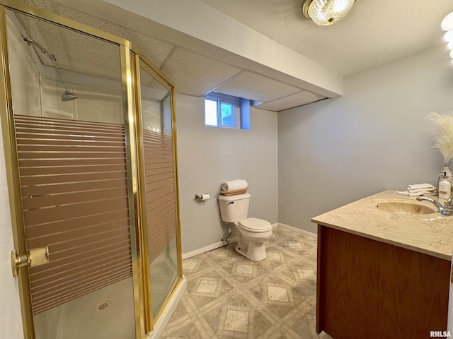 full bathroom with tile patterned floors, a stall shower, toilet, and baseboards