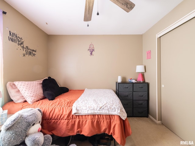 carpeted bedroom with ceiling fan