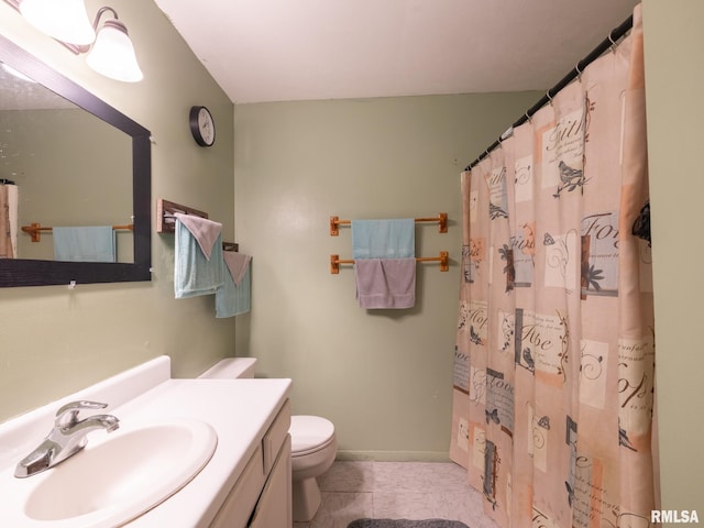 bathroom featuring toilet, a shower with shower curtain, tile patterned flooring, baseboards, and vanity