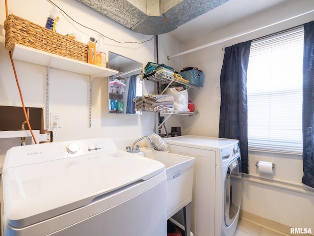 clothes washing area with laundry area and independent washer and dryer