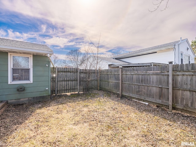 view of yard featuring a fenced backyard