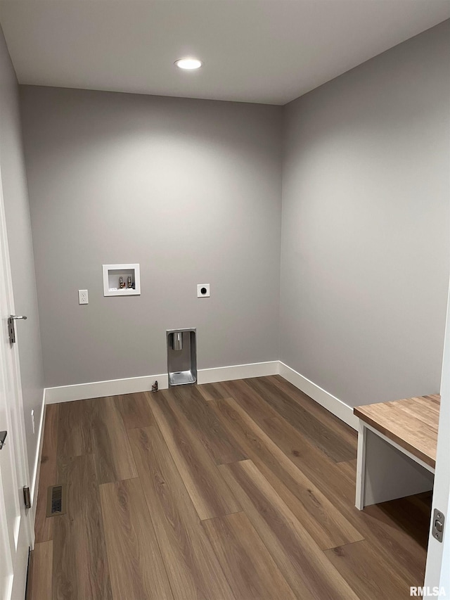 laundry area with electric dryer hookup, visible vents, dark wood finished floors, hookup for a washing machine, and recessed lighting
