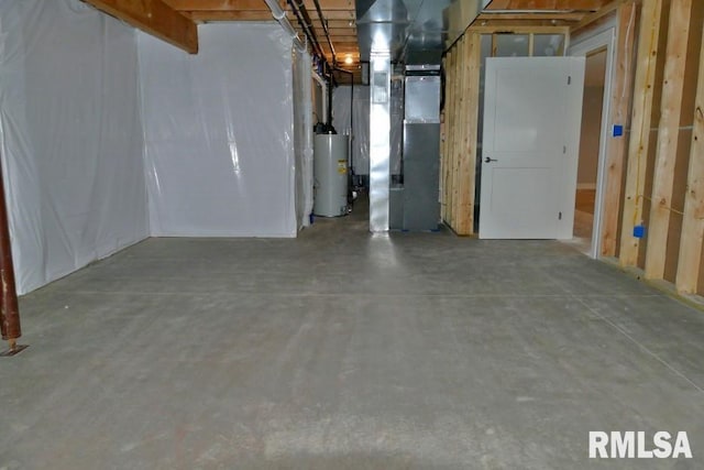 unfinished below grade area with gas water heater and heating unit