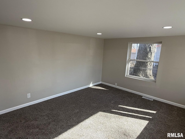 unfurnished room with carpet flooring, recessed lighting, and baseboards